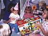 My cousins help me open my presents
