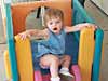 Getting ready to go down the slide