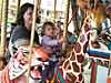 Riding the Merry-Go-Round with Mommy